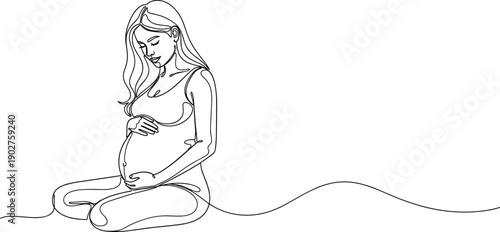 Pregnant woman sitting cross-legged holding belly pregnancy expecting mother
