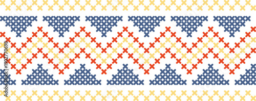 A colorful pattern of squares and crosses is displayed on a white background