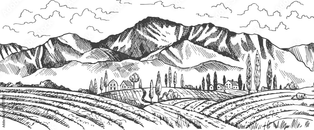 Obraz premium A mountain range with a small town in the valley