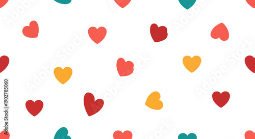 Repeating pattern of small, flat design hearts in warm colors on a white background.
