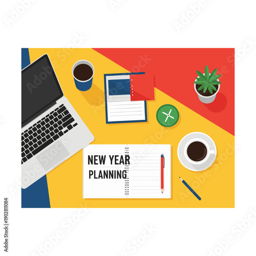 New year planning workspace with laptop and refreshments on colorful desk