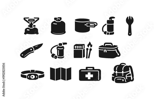 Camping essentials: stove, knife, backpack, first aid kit, flashlight, map