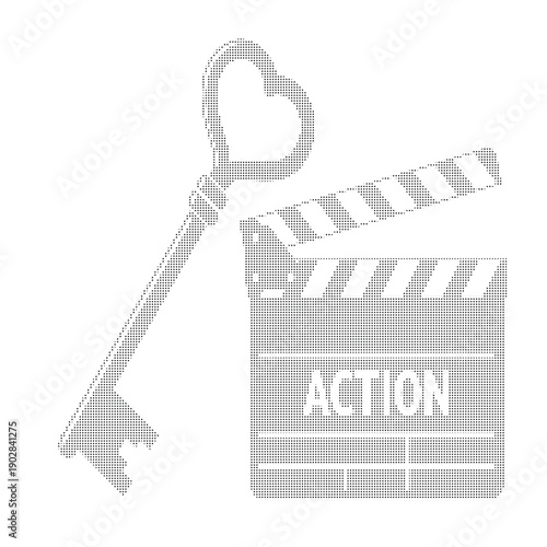 Heart shaped key on a black and white dotted clapperboard labeled action