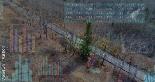 Aerial panning diagonal trail, charts tracking path, two walkers passing pine, showing eco data