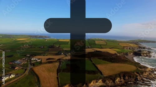 Drone starting forward flight carrying centered dark cross fields sliding beneath revealing cliffs