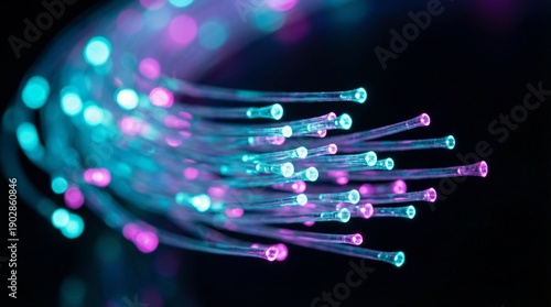 Glowing Fiber Optic Cable Ends with Cyan and Magenta Light