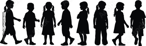 Set of children silhouettes standing and walking in different poses, showing boys and girls in profile view, representing childhood, growth, diversity, and active lifestyle on white background