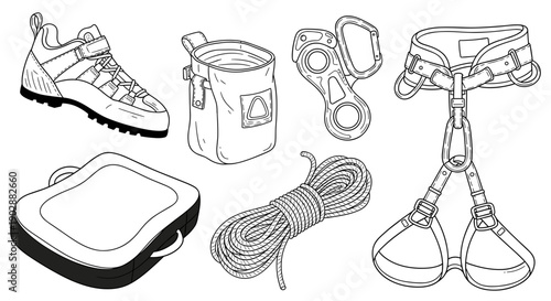 Essential climbing equipment laid out for adventure sturdy boot chalk bag carabiners harness protective pad and coiled rope representing outdoor