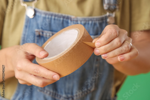 Young woman with adhesive t...