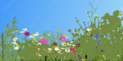 A vibrant wildflower meadow against a clear bright blue summer sky