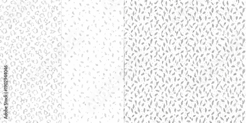 Abstract grayscale texture resembling scattered seeds or fine grain