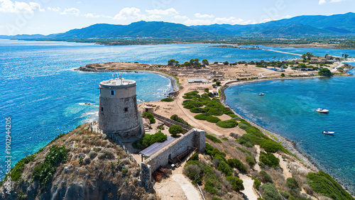 Aerial view of Nora archaeological site and Coltellazzo tower on Pula Cape in Southern Sardinia, Italy