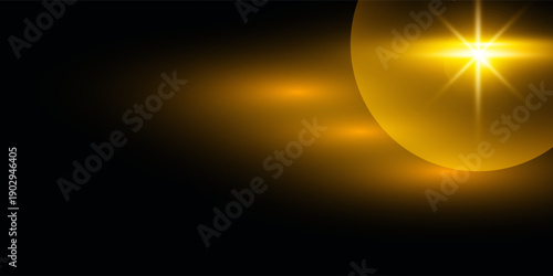Golden light flare with a bright horizontal beam and starburst effect on a dark black background.