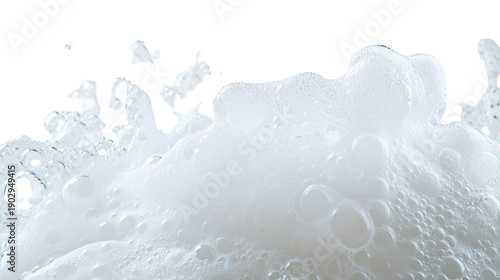 A close-up view of white foam on a transparent background