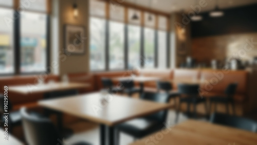 Wallpaper Mural Blurred background of contemporary casual restaurant interior featuring wooden tables, leather chairs, and a clean modern design, located in an urban dining space during the afternoon, Natural window. Torontodigital.ca