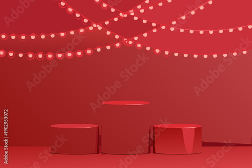 A minimalist red stage setup with string lights and cylindrical platforms