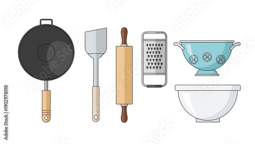 Kitchen utensils and cookware arranged neatly on a clean surface for food preparation and cooking activities