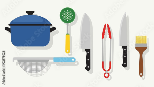 Collection of kitchen utensils and cookware arranged neatly on a clean surface