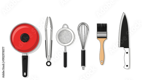 Assorted kitchen utensils and cookware arranged neatly on a clean surface from a top-down viewpoint