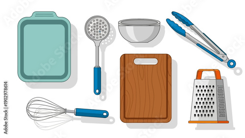 Assorted kitchen utensils and gadgets arranged on a white surface for culinary preparation and cooking activities