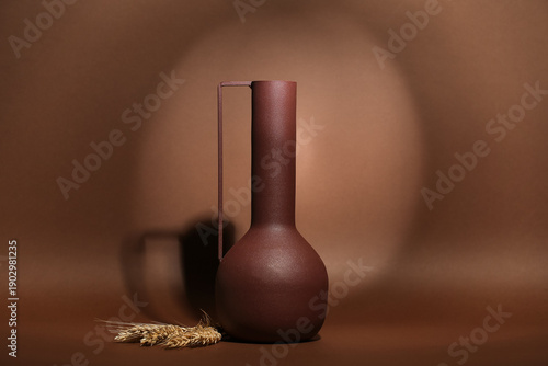 Old jug and wheat spikelets...