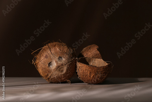 Fresh coconuts on dark back...