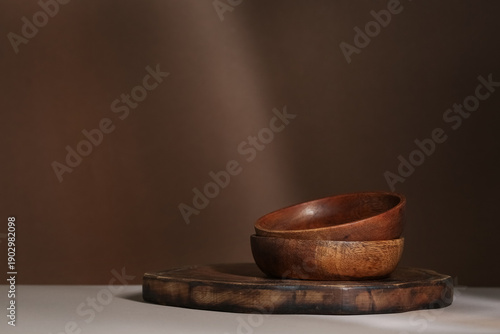 Wooden tray and bowls on br...