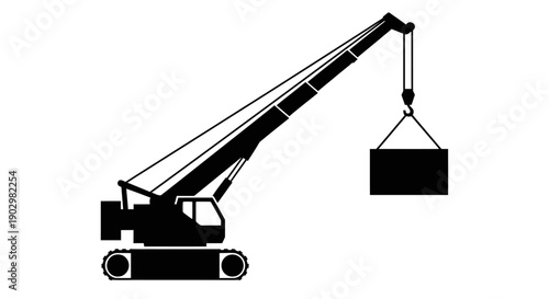 Crane lifting heavy load in industrial setting from side view