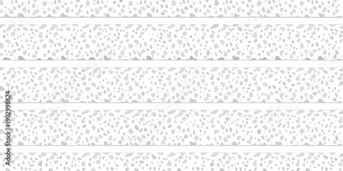 Abstract pattern of gray speckled bands on a white background