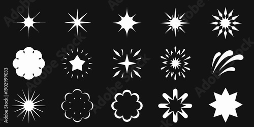 Collection of bright white starbursts and sparkling light effects on black