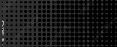 Black perforated metal plate. Metal grill. Black metal texture steel background. Perforated sheet metal.Abstract dark gray circle mesh pattern background texture.