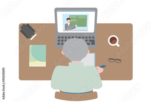 オンライン講座で学習するシニア男性