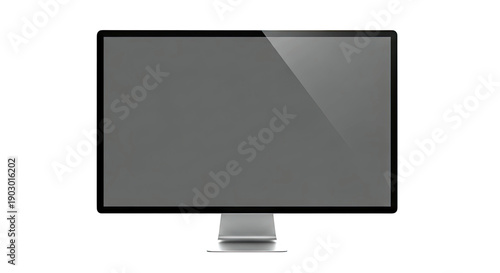 Modern computer monitor with a sleek silver stand and dark screen.