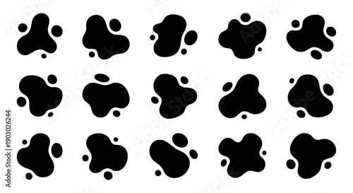 A collection of 15 abstract black blob shapes with small dots, arranged in a 3x5 grid.