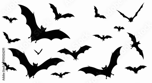 A collection of black bat silhouettes in various flying poses against a white background.