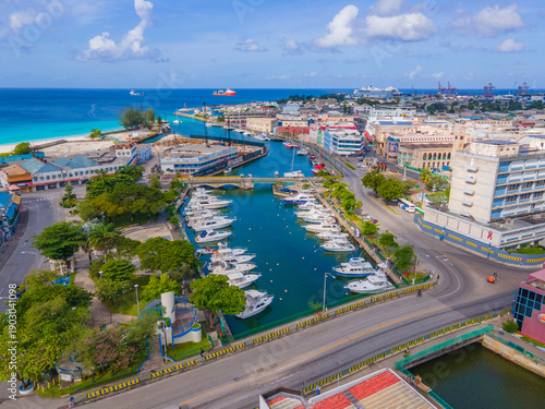 Quadro em tela Yachts moored at Careenage (Constitution River) in historic city center of Bridgetown, Barbados