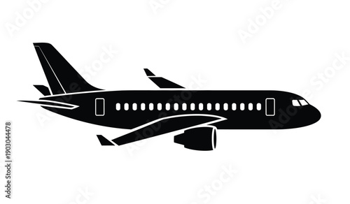 Black silhouette of a commercial airplane flying with sleek design and modern features