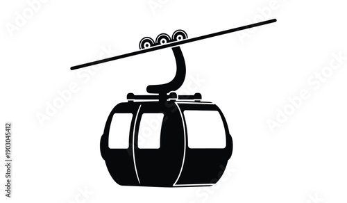A black silhouette of a cable car or gondola lift cabin suspended from a cable