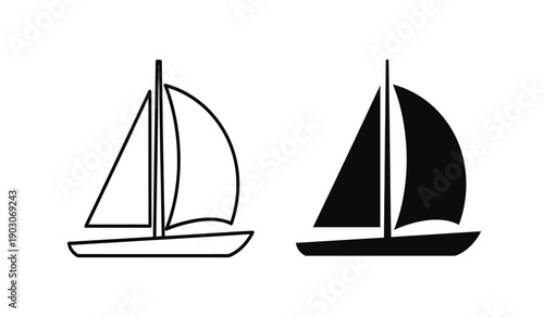 Two sailboats with different colored sails