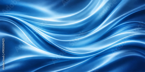Abstract wavy blue silk background with smooth satin texture and flowing light motion design creating a soft shiny textile fabric backdrop