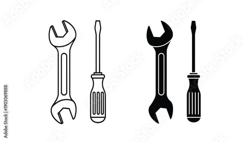 Four tools consisting of wrenches and screwdrivers in black and white