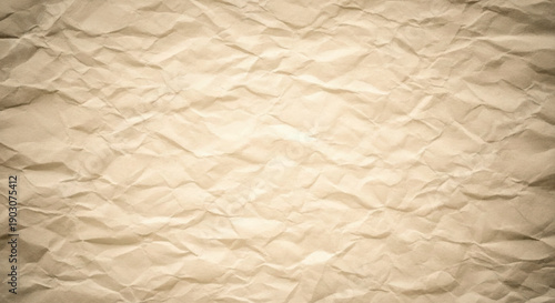 Close up of heavily wrinkled and crumpled beige paper texture