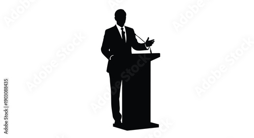 Silhouette of a confident businessman delivering an important speech from a modern presentation podium