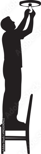 Man Changing Ceiling Light While Standing on Chair Silhouette