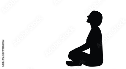 Silhouette of person breathing deeply in meditation position symbolizing calm and relaxation techniques
