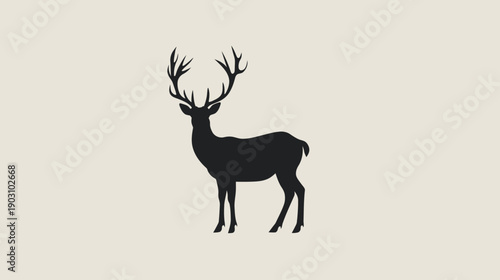 Silhouette of a majestic deer with large antlers against a neutral background