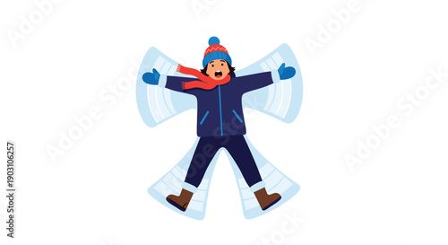 Happy young boy dressed in warm winter clothes including a blue jacket and red scarf makes a large snow angel while lying on the ground.