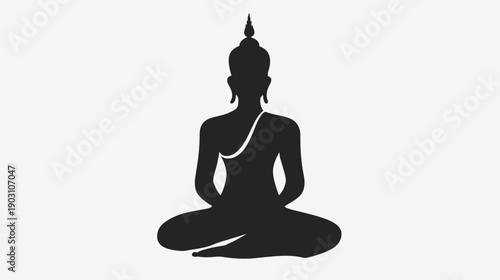 Silhouette of a seated buddha in meditation against a bright background