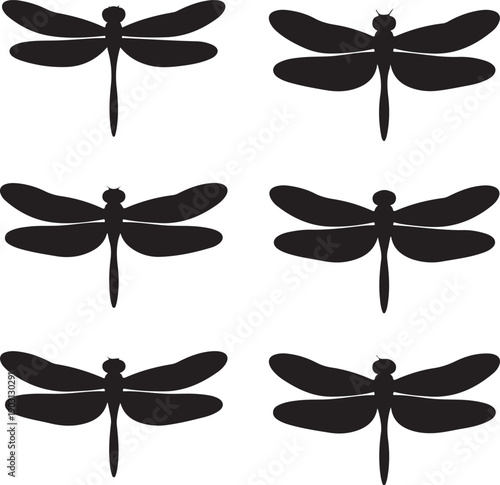 Black silhouettes of dragonflies on white background