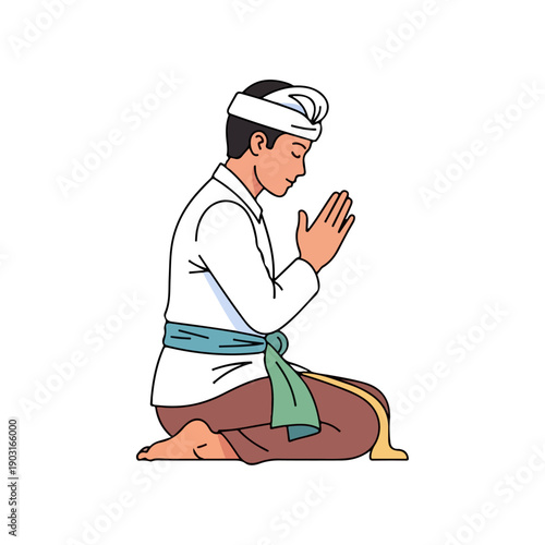 Balinese Man in Traditional Clothing Praying and Meditating